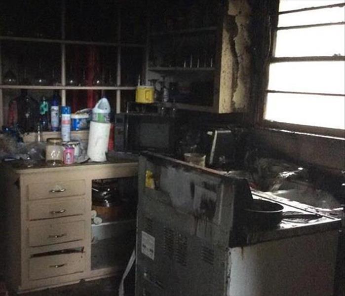 burned kitchen showing damage