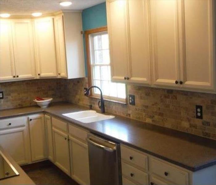 remodeled kitchen, new cabinets, and fixtures