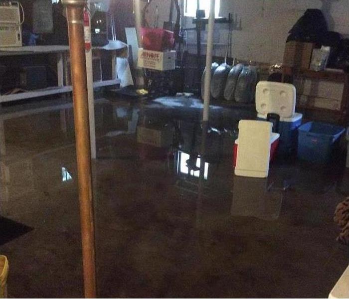 water pooling on basement floor, support poles